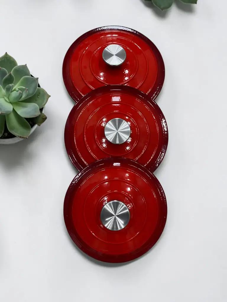 7-Piece Red Enameled Cast Iron Cookware Set. - View 3