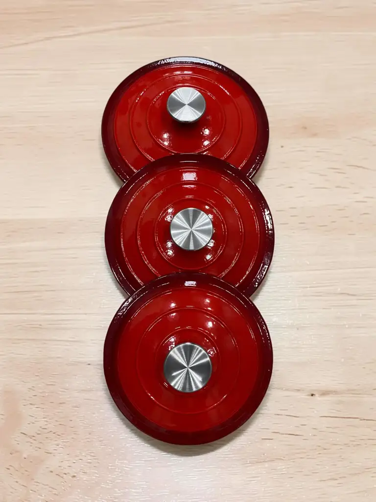 7-Piece Red Enameled Cast Iron Cookware Set. - View 3