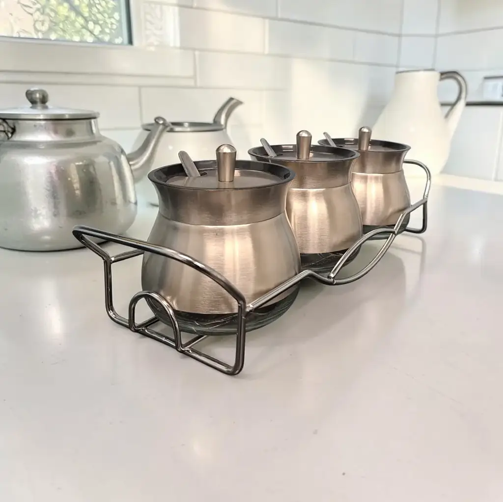 4 Piece Broad Glass Condiment Set In Polished Steel With Metal Rack & Scoops