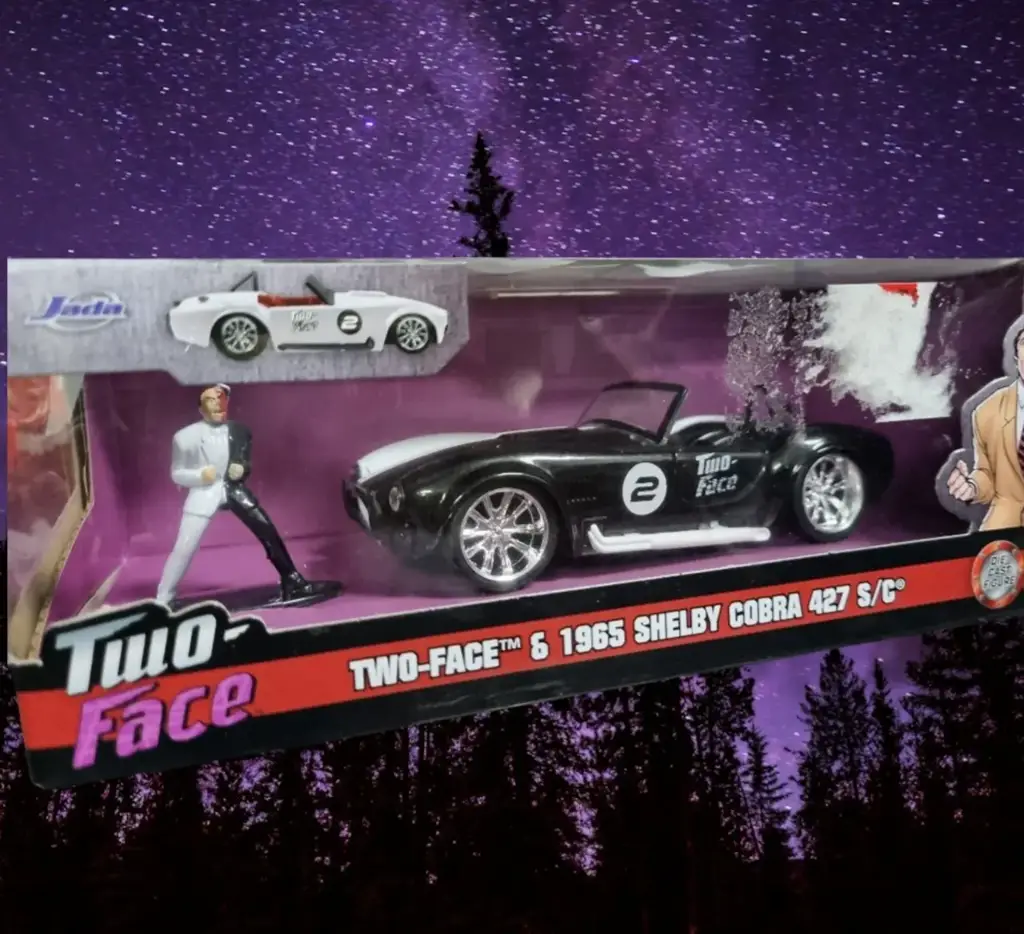 Two Face And Car Figurine