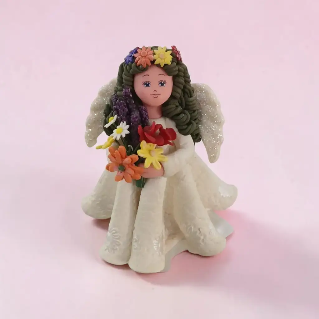 Decorative Angel Figurine With Floral Bouquet